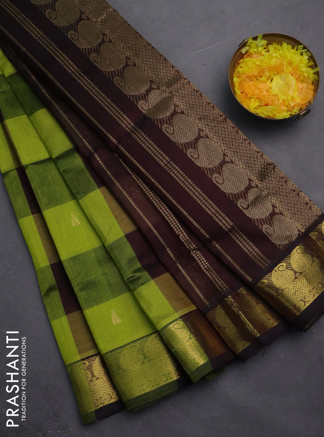Silk cotton saree light green and coffee brown with allover paalum pazhamum checks & buttas and zari woven border