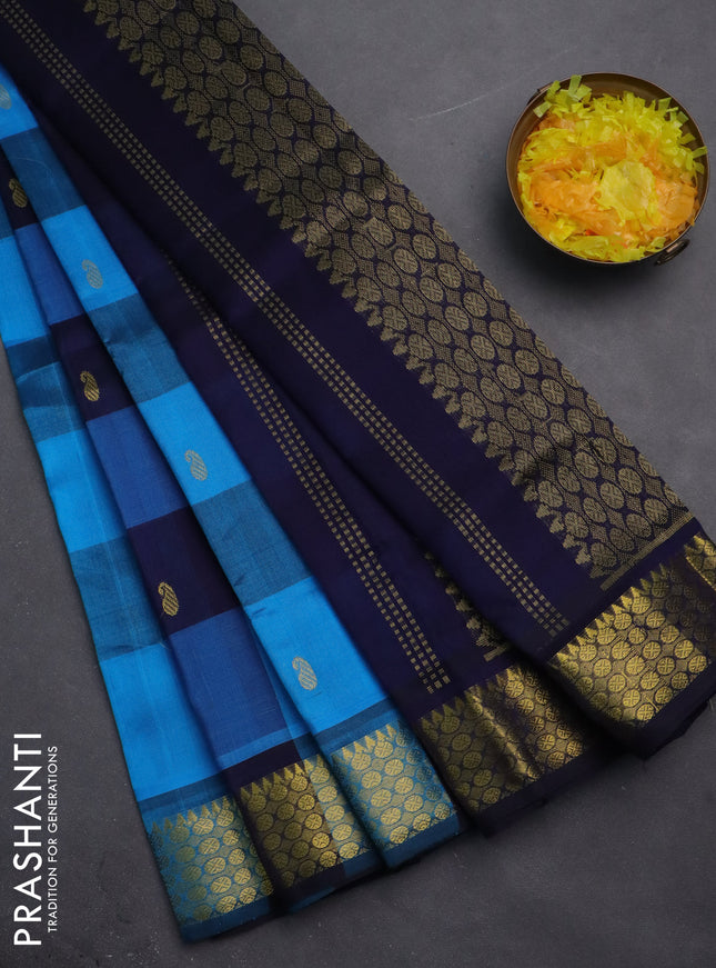 Silk cotton saree cs blue and navy blue with allover paalum pazhamum checks & buttas and zari woven border