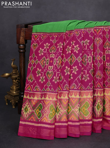 Rajkot patola silk saree green and pink with plain body and ikat woven zari border