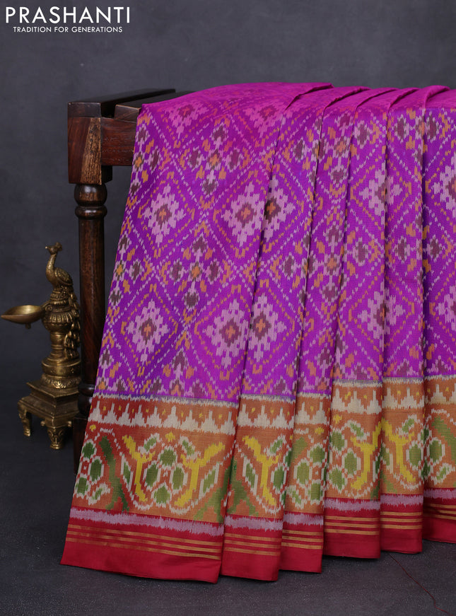 Rajkot patola silk saree purple and maroon with allover ikat weaves and ikat woven zari border