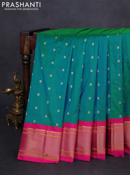 Pure paithani silk saree dual shade of teal bluish green and pink with allover floral zari woven buttas and paithani design weaving pallu