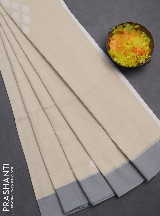 Khadi cotton saree beige and grey with thread woven ikat buttas and simple border