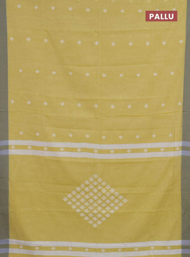 Khadi cotton saree yellow and grey with thread woven ikat buttas and simple border