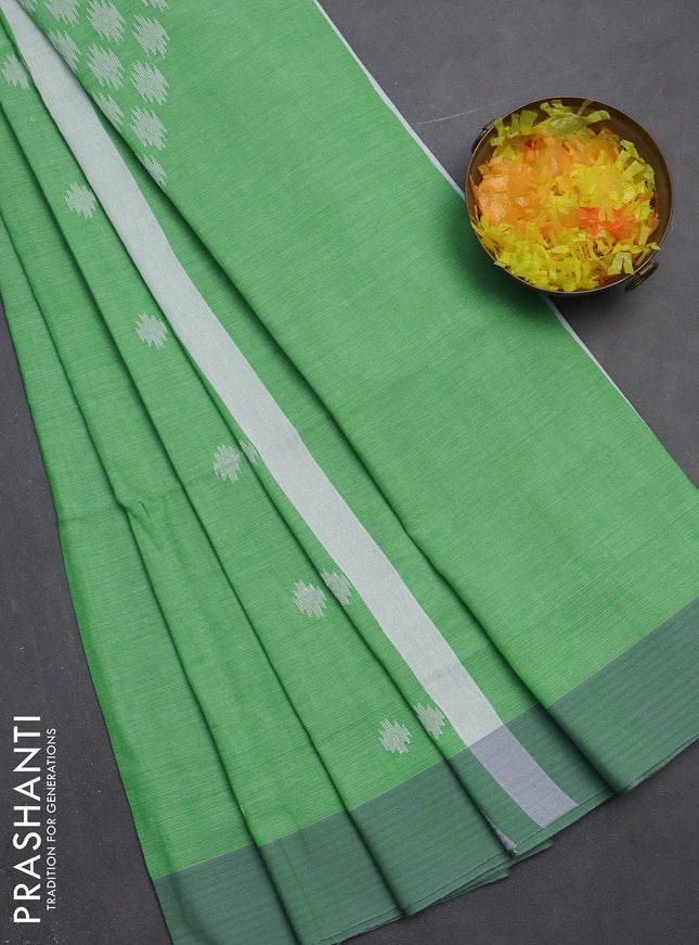 Khadi cotton saree green and grey with thread woven ikat buttas and simple border
