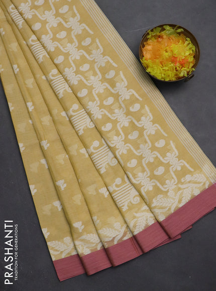 Khadi cotton saree yellow shade and mauve pink with allover thread woven floral buttas and simple border
