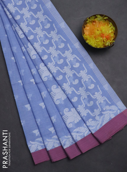 Khadi cotton saree blue shade and mauve pink with allover thread woven floral buttas and simple border