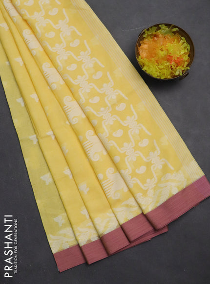 Khadi cotton saree pale yellow and mauve pink with allover thread woven floral buttas and simple border