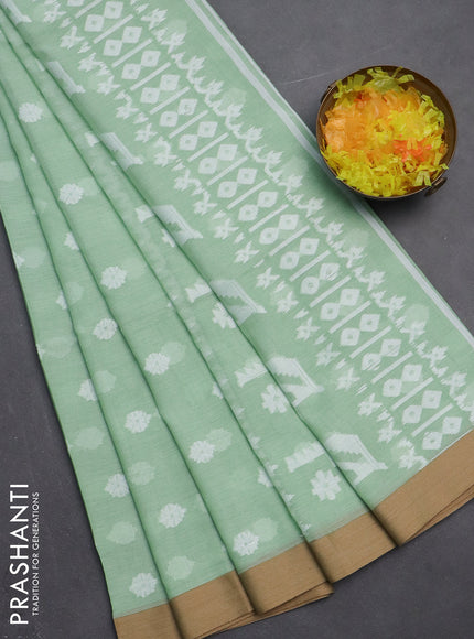 Khadi cotton saree green shade and sandal with allover thread woven ikat buttas and simple border