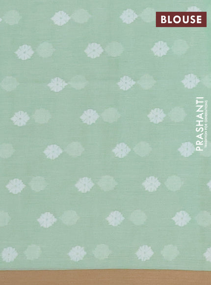 Khadi cotton saree green shade and sandal with allover thread woven ikat buttas and simple border