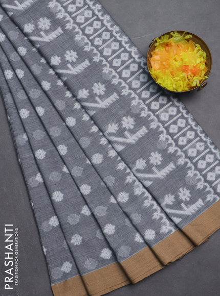 Khadi cotton saree grey and sandal with allover thread woven ikat buttas and simple border
