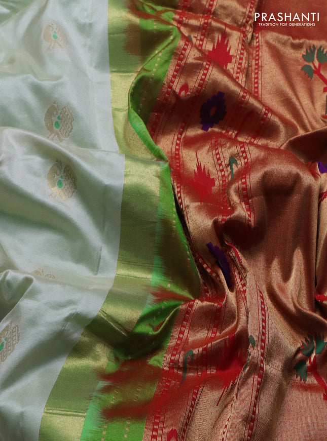 Pure paithani silk saree off white and green with annam zari woven buttas and zari woven korvai border
