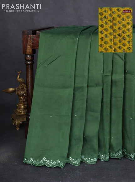 Satin crepe silk saree sap green and mustard yellow with allover mirror work and ajrakh printed blouse