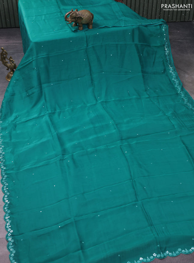 Satin crepe silk saree teal blue and black with allover mirror work and ajrakh printed blouse