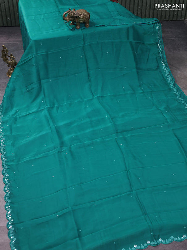 Satin crepe silk saree teal blue and black with allover mirror work and ajrakh printed blouse