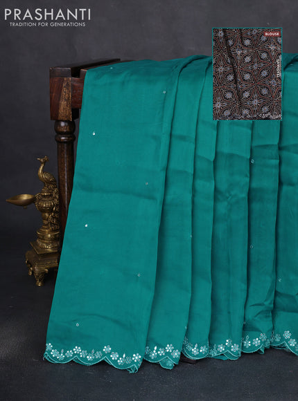 Satin crepe silk saree teal blue and black with allover mirror work and ajrakh printed blouse