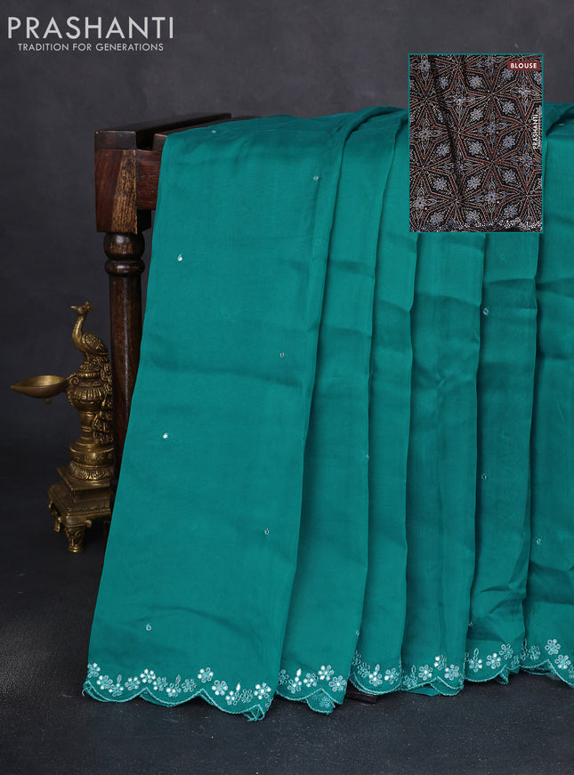 Satin crepe silk saree teal blue and black with allover mirror work and ajrakh printed blouse