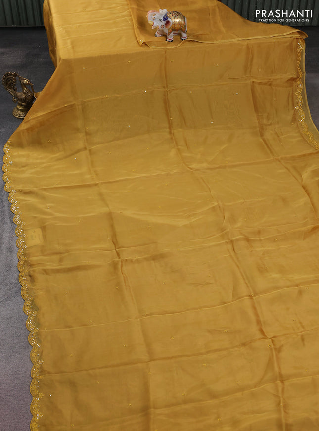 Satin crepe silk saree mustard yellow and maroon with allover mirror work and ajrakh printed blouse