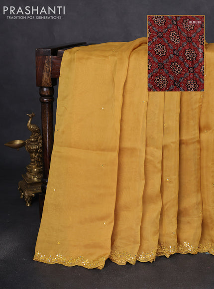 Satin crepe silk saree mustard yellow and maroon with allover mirror work and ajrakh printed blouse