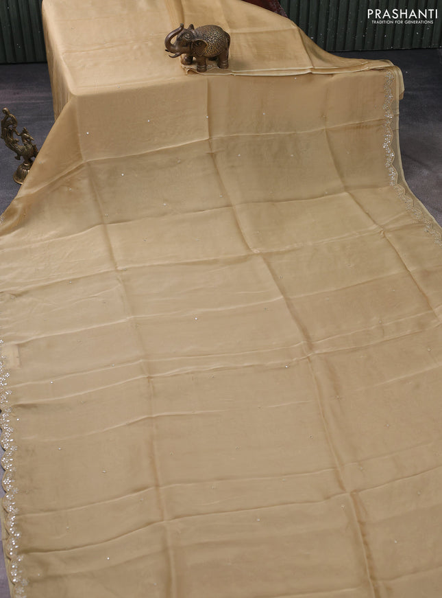 Satin crepe silk saree sandal and maroon with allover mirror work and ajrakh printed blouse