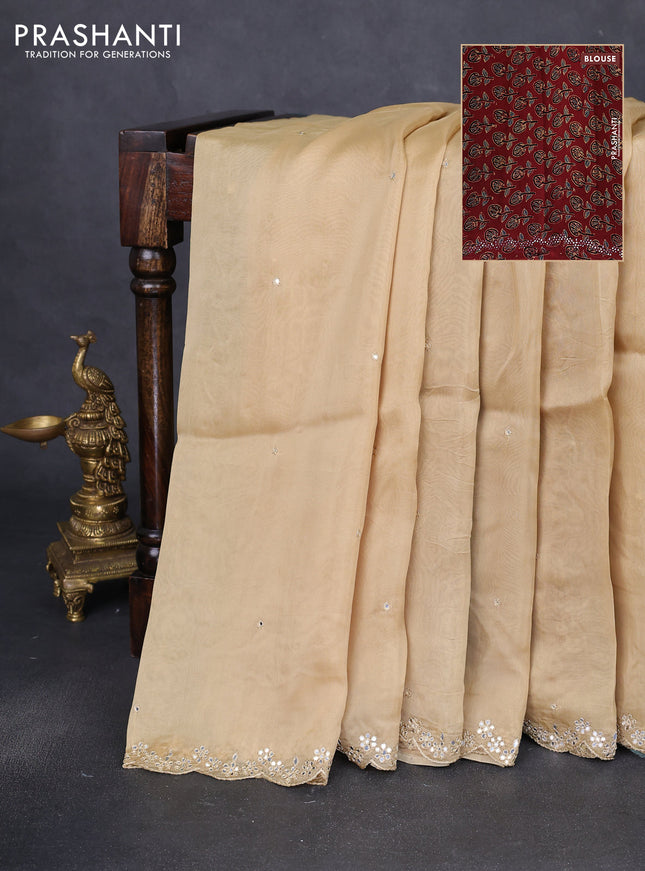 Satin crepe silk saree sandal and maroon with allover mirror work and ajrakh printed blouse