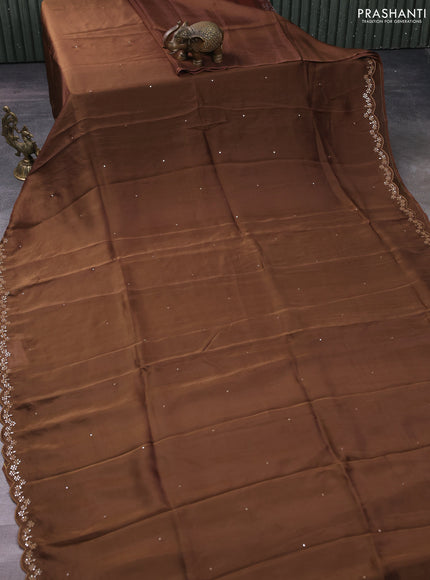 Satin crepe silk saree brown and black with allover mirror work and ajrakh printed blouse