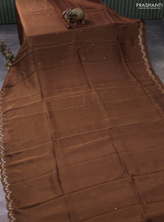 Satin crepe silk saree brown and black with allover mirror work and ajrakh printed blouse