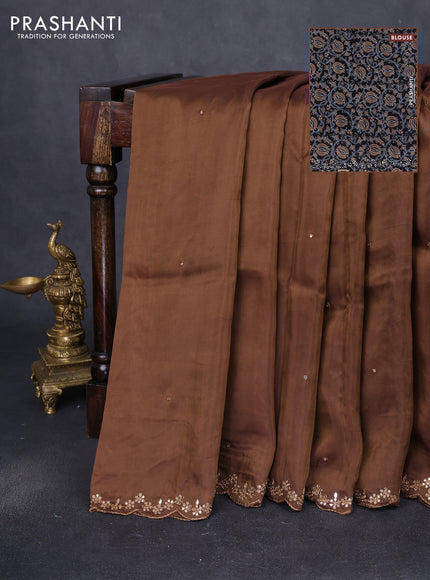 Satin crepe silk saree brown and black with allover mirror work and ajrakh printed blouse