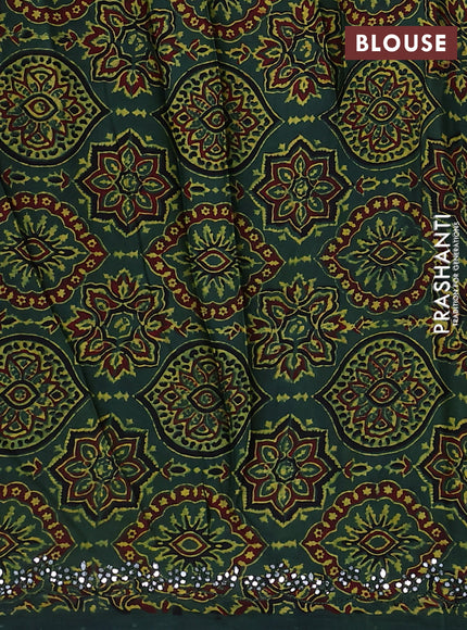 Satin crepe silk saree black and green with allover mirror work and ajrakh printed blouse