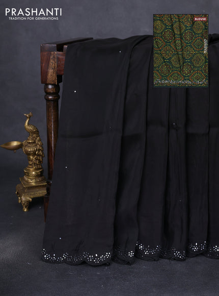 Satin crepe silk saree black and green with allover mirror work and ajrakh printed blouse