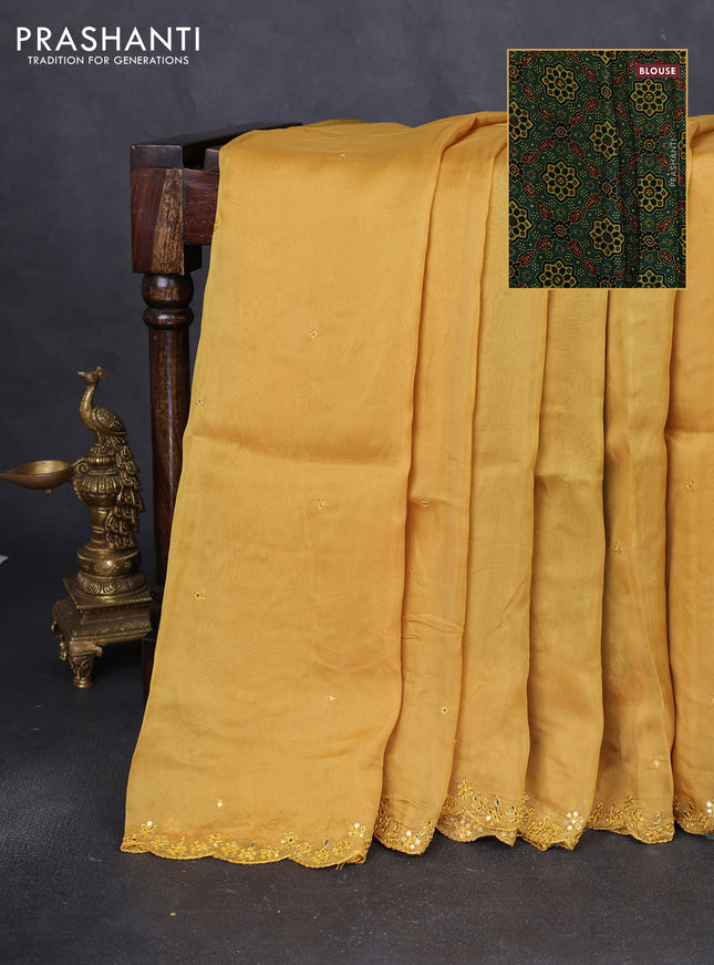Satin crepe silk saree mustard yellow and green with allover mirror work and ajrakh printed blouse