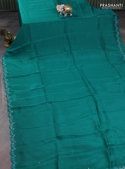 Satin crepe silk saree teal green and black with allover mirror work and ajrakh printed blouse