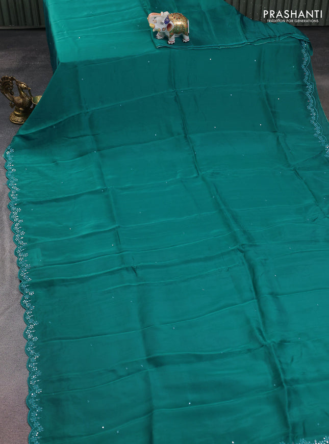 Satin crepe silk saree teal green and black with allover mirror work and ajrakh printed blouse