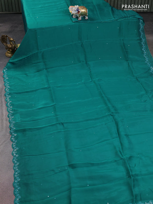 Satin crepe silk saree teal green and black with allover mirror work and ajrakh printed blouse