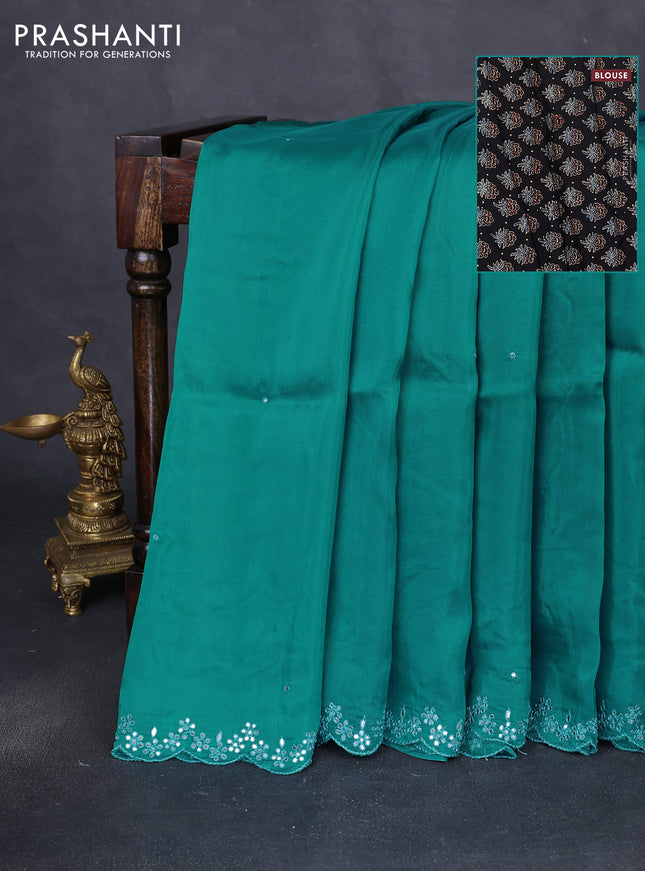 Satin crepe silk saree teal green and black with allover mirror work and ajrakh printed blouse