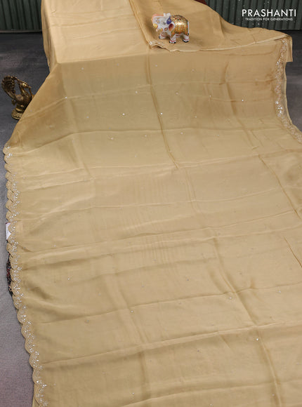 Satin crepe silk saree sandal and black with allover mirror work and ajrakh printed blouse