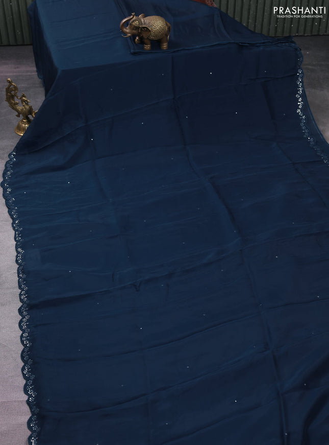 Satin crepe silk saree peacock blue and maroon with allover mirror work and ajrakh printed blouse