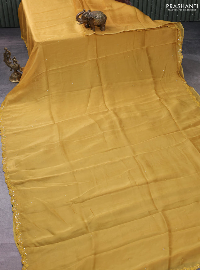 Satin crepe silk saree yellow and green with allover mirror work and ajrakh printed blouse