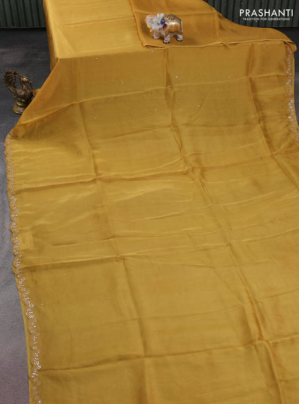 Satin crepe silk saree yellow and green with allover mirror work and ajrakh printed blouse