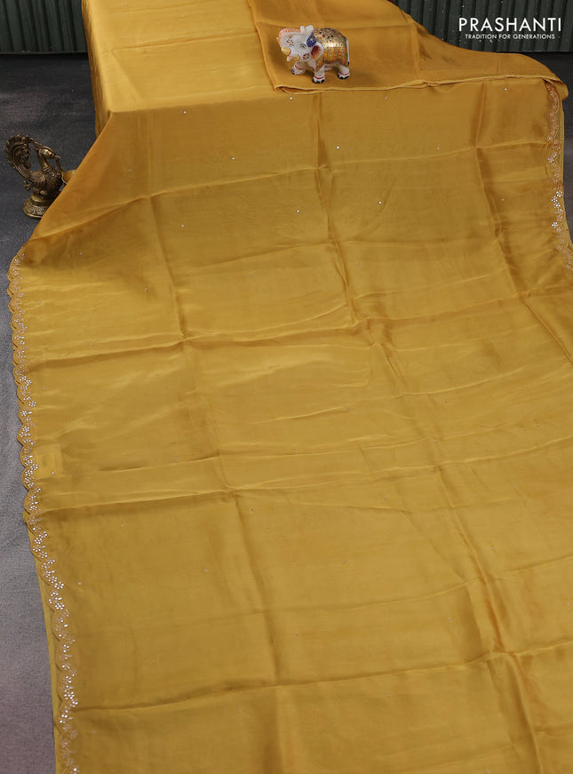 Satin crepe silk saree yellow and green with allover mirror work and ajrakh printed blouse