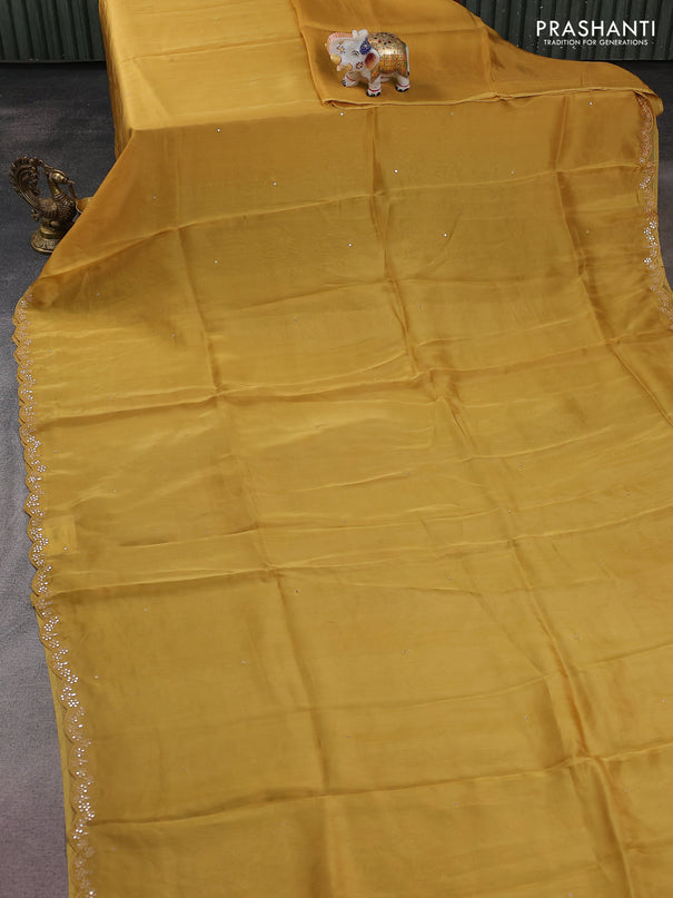 Satin crepe silk saree yellow and green with allover mirror work and ajrakh printed blouse