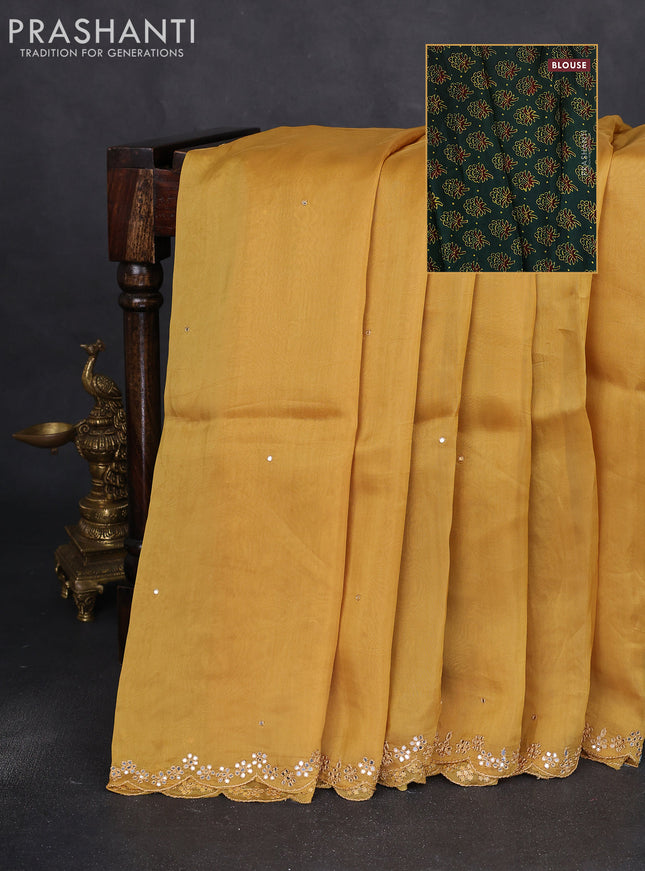 Satin crepe silk saree yellow and green with allover mirror work and ajrakh printed blouse