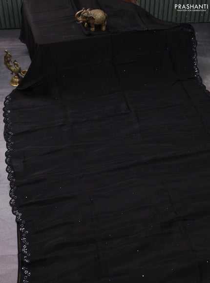 Satin crepe silk saree black and green with allover mirror work and ajrakh printed blouse