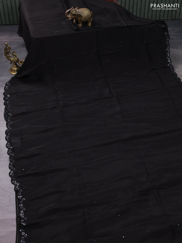 Satin crepe silk saree black and green with allover mirror work and ajrakh printed blouse