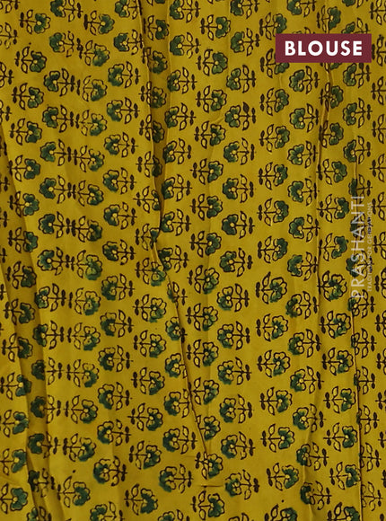 Satin crepe silk saree sap green and yellow with allover mirror work and ajrakh printed blouse