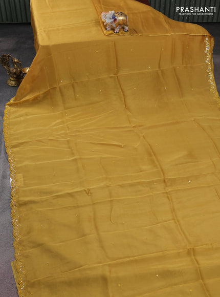 Satin crepe silk saree yellow and green with allover mirror work and ajrakh printed blouse