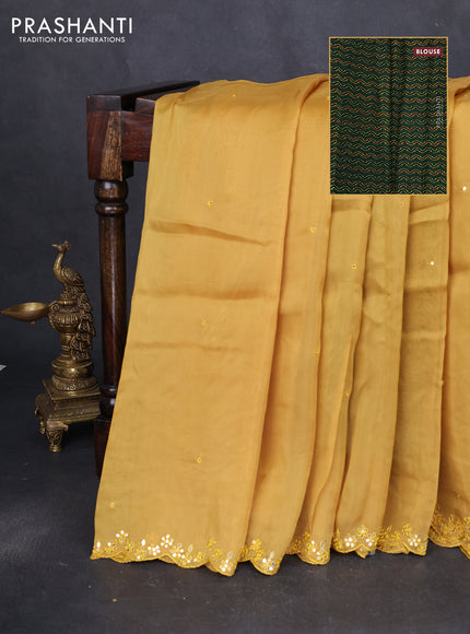 Satin crepe silk saree yellow and green with allover mirror work and ajrakh printed blouse