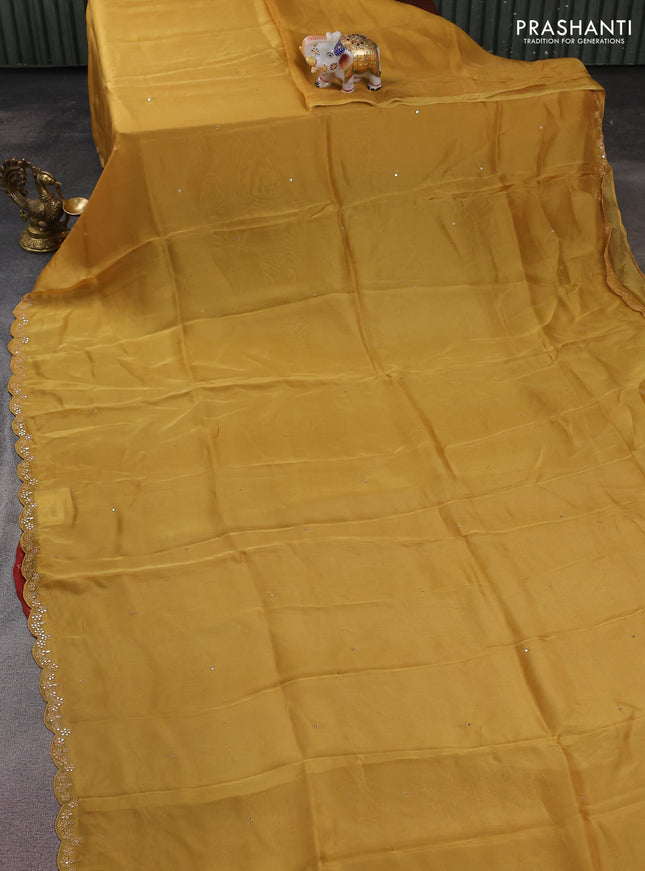 Satin crepe silk saree mustard yellow and maroon with allover mirror work and ajrakh printed blouse