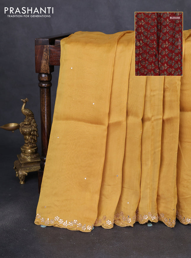 Satin crepe silk saree mustard yellow and maroon with allover mirror work and ajrakh printed blouse