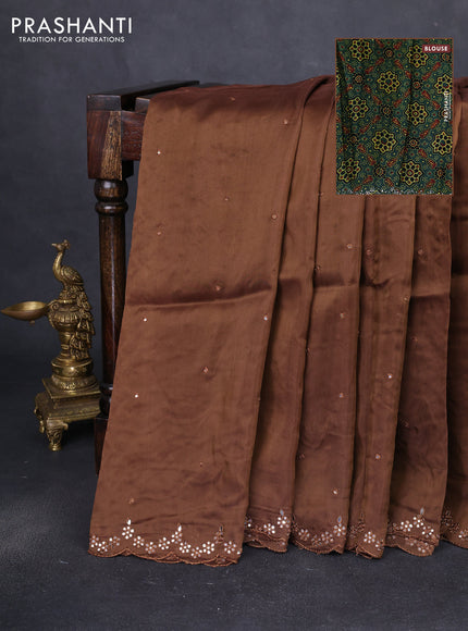 Satin crepe silk saree brown and green with allover mirror work and ajrakh printed blouse