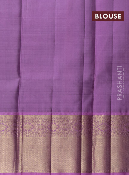 Pure silk lehenga dhawani bottle green and lotus pink with allover zari checks & buttas and rich zari woven korvai border